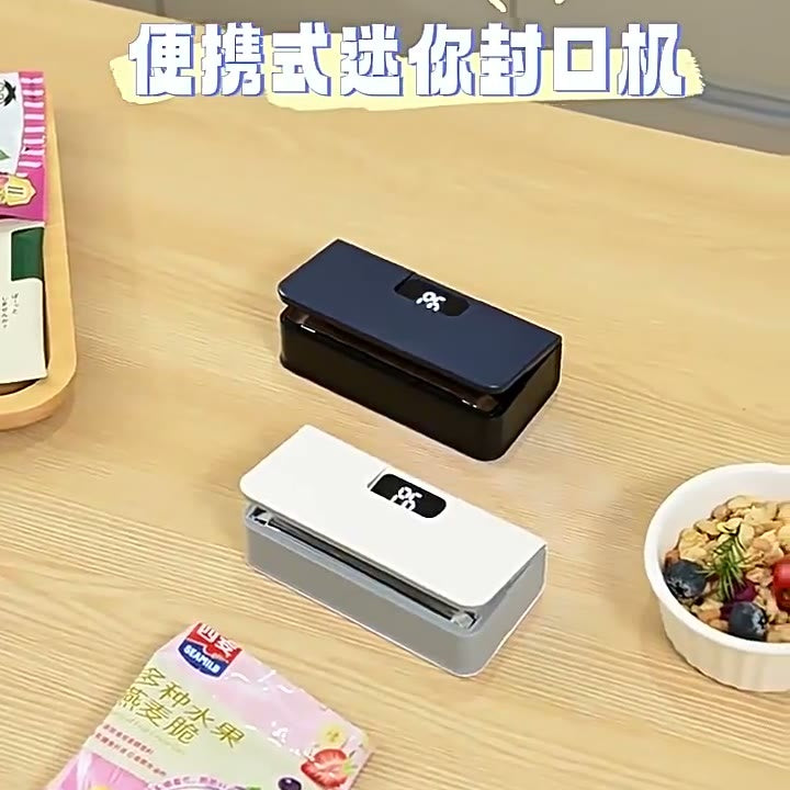 Mini Bag Sealer held in one hand, showing the digital heat level display