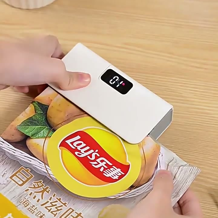 The sealer closing the top of an opened snack bag